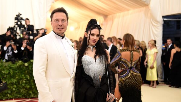 NEW YORK, NY - MAY 07: Elon Musk and Grimes attend the Heavenly Bodies: Fashion & The Catholic Imagination Costume Institute Gala at The Metropolitan Museum of Art on May 7, 2018 in New York City.  - Sputnik International