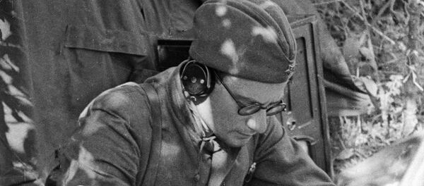 A Soviet radio operator jots down information from the Sovinformbureau, May 1942. - Sputnik International