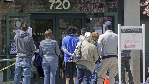 People line up outside the Utah Department of workforce Services Monday, April 13, 2020, in Salt Lake City. - Sputnik International