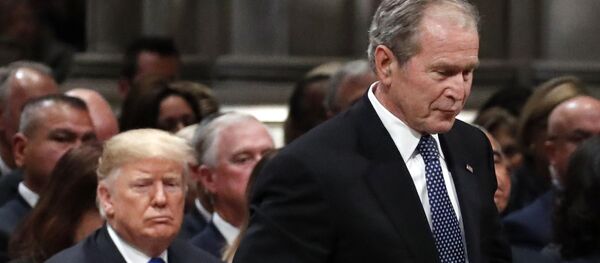 Former President George W. Bush walks past President Donald Trump to speak at the State Funeral for his father, former President George H.W. Bush, at the State Funeral at the National Cathedral, Wednesday, Dec. 5, 2018, in Washington Former President George W. Bush walks past President Donald Trump to speak at the State Funeral for his father, former President George H.W. Bush, at the State Funeral at the National Cathedral, Wednesday, Dec. 5, 2018, in Washington - Sputnik International
