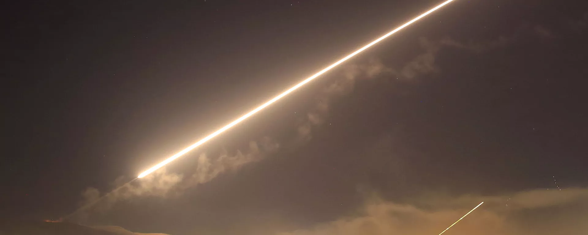 FILE - In this April 14, 2018 file photo, Damascus skies erupt with surface to air missile fire as the U.S. launches an attack on Syria targeting different parts of the Syrian capital Damascus, Syria - Sputnik International, 1920, 06.12.2024