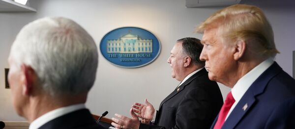 U.S. Vice President Mike Pence and President Donald Trump listen as Secretary of State Mike Pompeo addresses the daily coronavirus task force briefing at the White House in Washington, U.S., April 8, 2020 U.S. Vice President Mike Pence and President Donald Trump listen as Secretary of State Mike Pompeo addresses the daily coronavirus task force briefing at the White House in Washington, U.S., April 8, 2020 - Sputnik International
