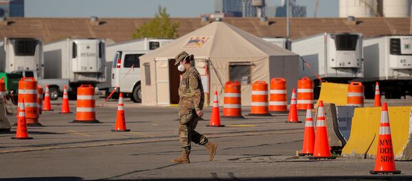 A U.S. Army National Guard soldier walks outside a temporary morgue, during the outbreak of the coronavirus disease (COVID-19) in the Brooklyn borough of New York City, U.S., May 5, 2020 A U.S. Army National Guard soldier walks outside a temporary morgue, during the outbreak of the coronavirus disease (COVID-19) in the Brooklyn borough of New York City, U.S., May 5, 2020 - Sputnik International