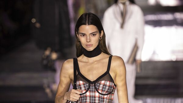 Model Kendall Jenner wears a creation by designer Burberry at the Autumn/Winter 2020 fashion week runway show in London, Monday, Feb. 17, 2020. - Sputnik International