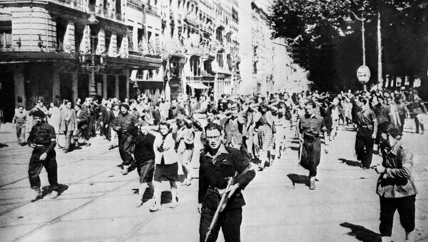 French collaborators are marched through the streets of Lyon in 1945 - Sputnik International
