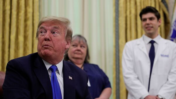 U.S. President Donald Trump speaks during an event in honor of National Nurses Day in the Oval Office at the White House in Washington, U.S., May 6, 2020 - Sputnik International
