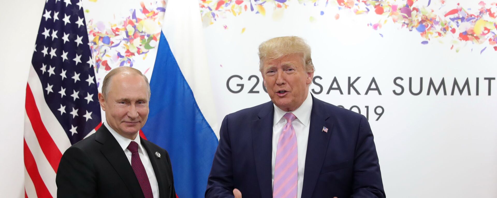 U.S. President Donald Trump, right, and Russian President Vladimir Putin pose for a photo during a bilateral meeting on the sidelines of the G-20 summit in Osaka, Japan, Friday, June 28, 2019. - Sputnik International, 1920, 11.02.2024