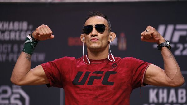 Tony Ferguson poses during a ceremonial weigh-in for the UFC 229 mixed martial arts fight Friday, Oct. 5, 2018, in Las Vegas. Ferguson is scheduled to fight Anthony Pettis Saturday in Las Vegas. - Sputnik International