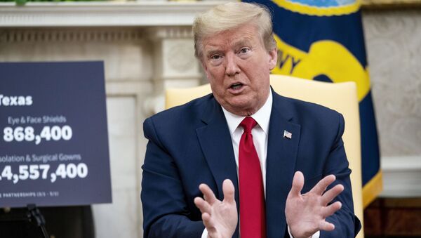 U.S. President Donald Trump speaks to reporters while hosting Texas Governor Greg Abbott about what his state has done to restart business during the novel coronavirus pandemic in the Oval Office at the White House May 07, 2020 in Washington, DC. - Sputnik International