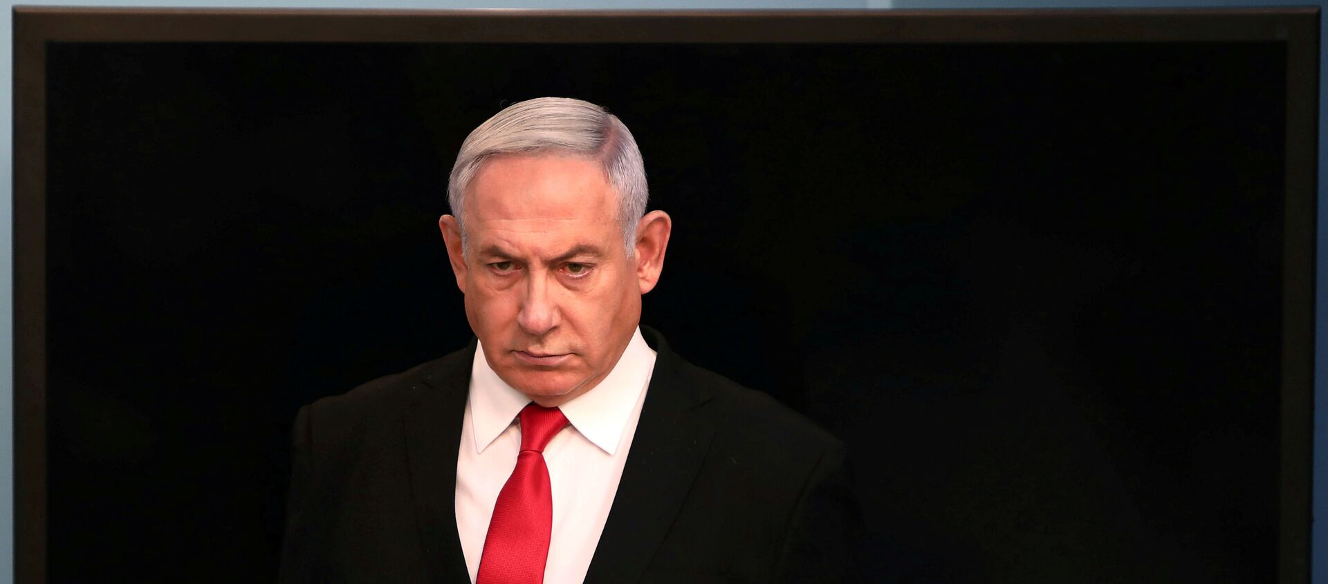 Israeli Prime Minister Benjamin Netanyahu arrives for a speech at his Jerusalem office, regarding the new measures that will be taken to fight the coronavirus, March 14, 2020 - Sputnik International, 1920, 23.11.2020