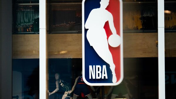  In this file photo taken on March 11, 2020 an NBA logo is shown at the 5th Avenue NBA store in New York City.   BasketNBAhealthvirustests - The NBA has advised teams not to arrange coronavirus tests for players and staff not showing symptoms, ESPN reported on May 1, 2020, saying it was inappropriate with only limited public testing available. - Sputnik International