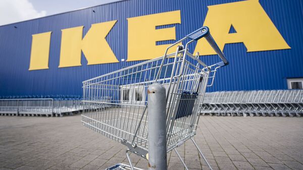 Until further notice, the branch of the furniture chain Ikea at the location of the company's German headquarters in Wallau near Wiesbaden is closed, in front of which an empty shopping trolley is standing, Germany, Tuesday, March 17, 2020. - Sputnik International