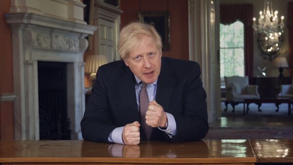 In this grab taken from video issued by Downing Street on Sunday, May 10, 2020, Britain's Prime Minister Boris Johnson delivers an address on lifting the country's lockdown amid the coronavirus pandemic. - Sputnik International