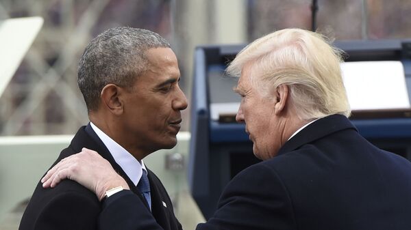 President Barack Obama speaks with President-elect Donald Trump during the presidential inauguration at the US Capitol in Washington, 20 January 2017. - Sputnik International