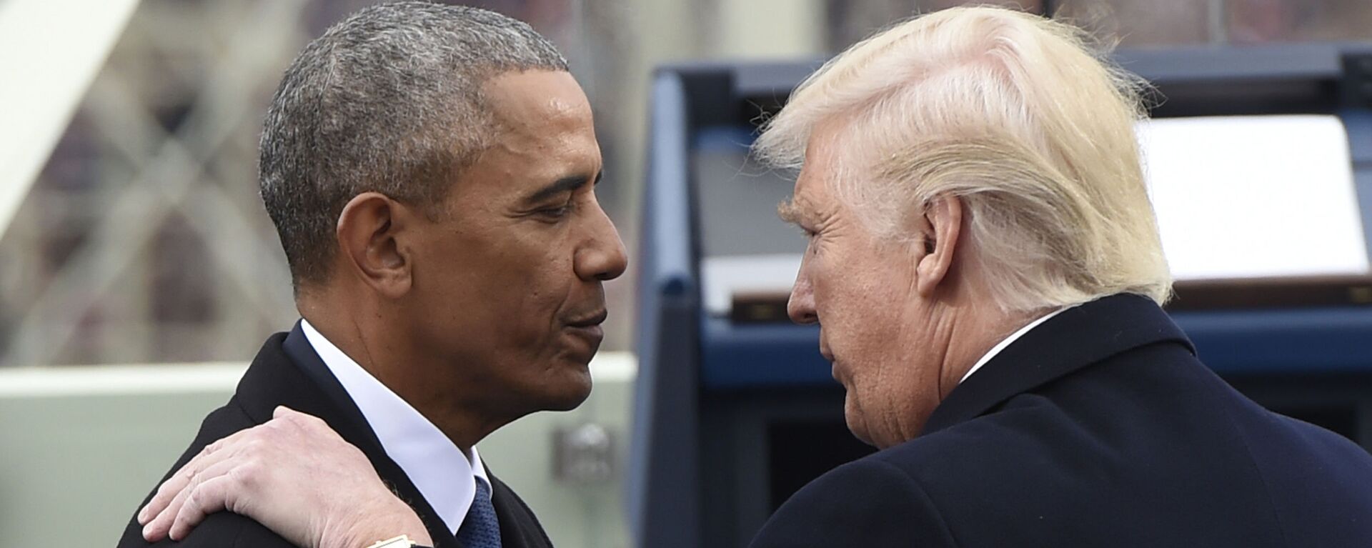 President Barack Obama speaks with President-elect Donald Trump during the presidential inauguration at the U.S. Capitol in Washington, Friday, Jan 20, 2017. - Sputnik International, 1920, 20.05.2021