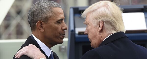 President Barack Obama speaks with President-elect Donald Trump during the presidential inauguration at the US Capitol in Washington, 20 January 2017. - Sputnik International