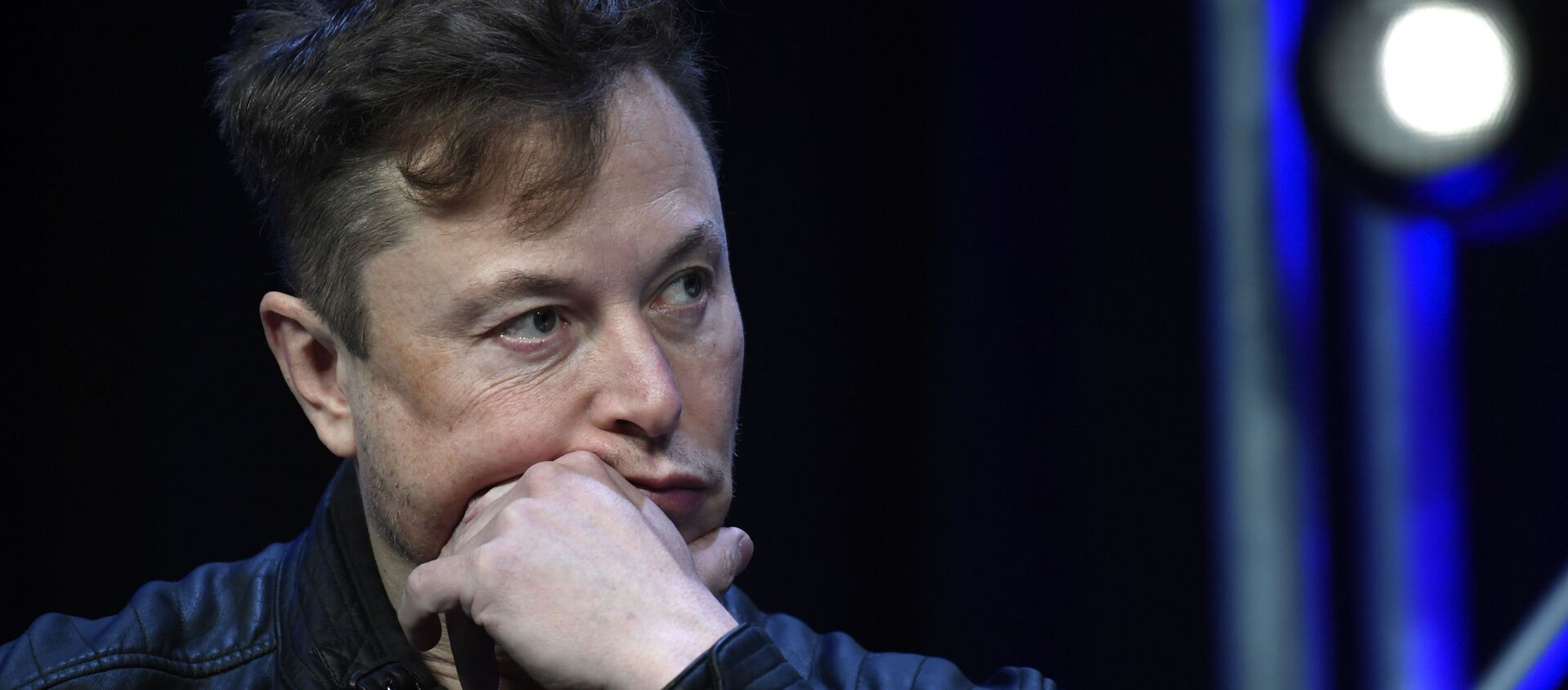 Tesla and SpaceX Chief Executive Officer Elon Musk listens to a question as he speaks at the SATELLITE Conference and Exhibition in Washington, Monday, March 9, 2020 - Sputnik International, 1920, 24.04.2021