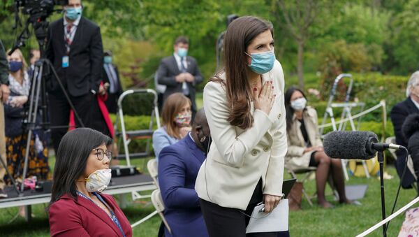 CNN White House correspondent Kaitlan Collins tries to ask her question of U.S. President Donald Trump after he called on her on the heels of an exchange with CBS News correspondent Weijia Jiang (L) during a coronavirus disease (COVID-19) outbreak response briefing at the White House in Washington, U.S., May 11, 2020. The president refused to hear Collins' question, then ended and left the news conference - Sputnik International
