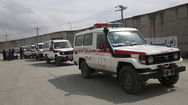 Ambulances wait near the site of an attack in Kabul, Afghanistan, Wednesday, March 25, 2020 - Sputnik International
