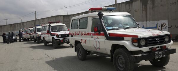 Ambulances wait near the site of an attack in Kabul, Afghanistan, Wednesday, March 25, 2020 - Sputnik International