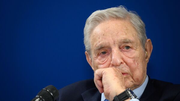 Hungarian-born US investor and philanthropist George Soros looks on during a speech on the sidelines of the World Economic Forum (WEF) annual meeting, on January 23, 2020 in Davos, eastern Switzerland. - Sputnik International