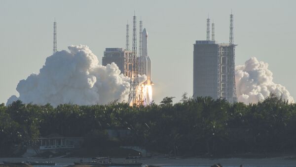 A Long March 5B rocket lifts off from the Wenchang launch site on China's southern Hainan island on May 5, 2020. - Chinese state media reported the successful launch of a new rocket on May 5, a major test of its ambitions to operate a permanent space station and send astronauts to the Moon. - Sputnik International