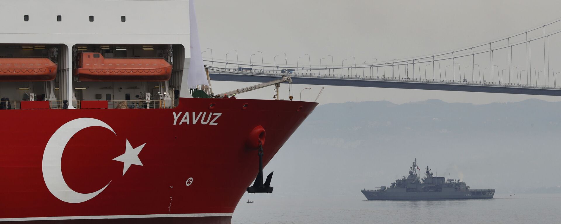 In this Thursday, June 20, 2019 file photo, Turkey's 230-meter (750-foot) drillship 'Yavuz' escorted by a Turkish Navy vessel, crosses the Marmara Sea on its way to the Mediterranean, from the port of Dilovasi, outside Istanbul - Sputnik International, 1920, 24.12.2020