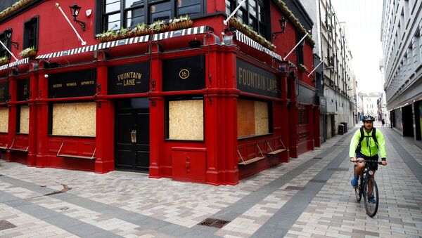 A closed and boarded-up pub is seen in Belfast during the coronavirus outbreak, in Belfast, Northern Ireland, May 7, 2020.  - Sputnik International