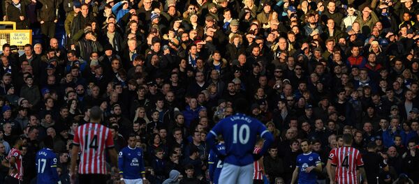 n this file photo taken on January 02, 2017 Fans shield their eyes from the Sun during the English Premier League football match between Everton and Southampton at Goodison Park in Liverpool, north west England. n this file photo taken on January 02, 2017 Fans shield their eyes from the Sun during the English Premier League football match between Everton and Southampton at Goodison Park in Liverpool, north west England. - Sputnik International