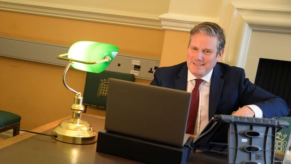 Britain’s opposition Labour Party Leader Keir Starmer is seen in his office as he launches ‘Call Keir’ online public meetings, at the Houses of Parliament, following the outbreak of the coronavirus disease (COVID-19), in London, Britain, April 30, 2020 - Sputnik International