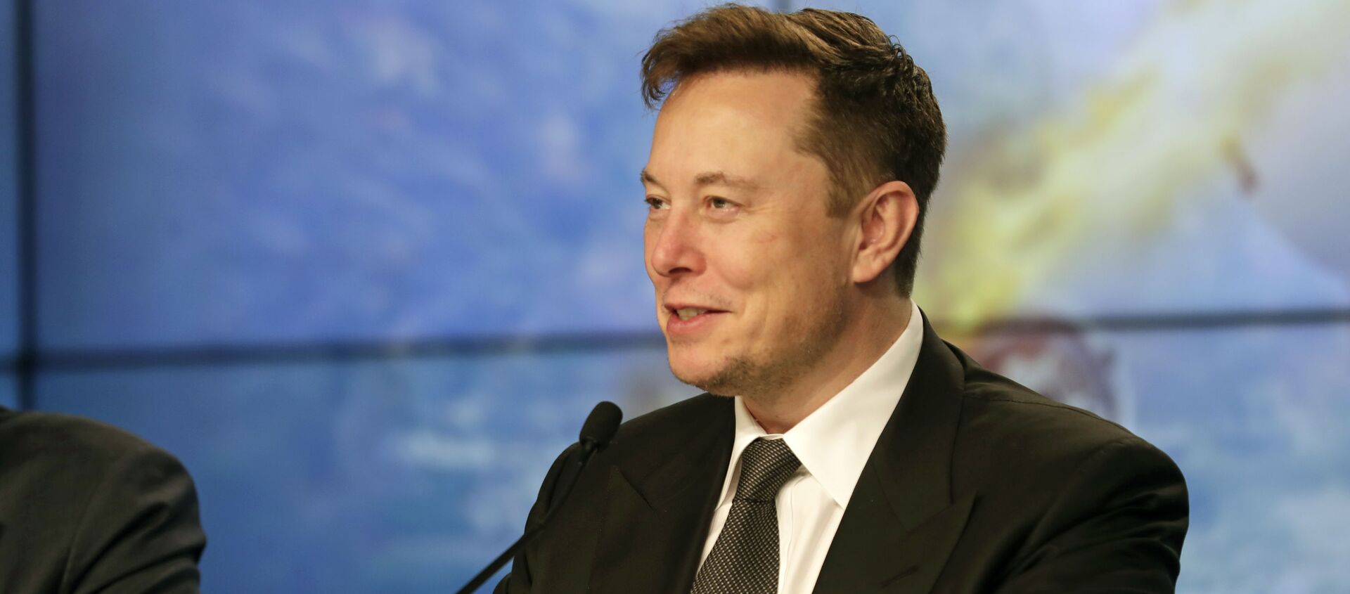 Elon Musk, founder, CEO, and chief engineer/designer of SpaceX speaks during a news conference after a Falcon 9 SpaceX rocket test flight to demonstrate the capsule's emergency escape system at the Kennedy Space Center in Cape Canaveral, Fla., Sunday, Jan. 19, 2020 - Sputnik International, 1920, 11.07.2020