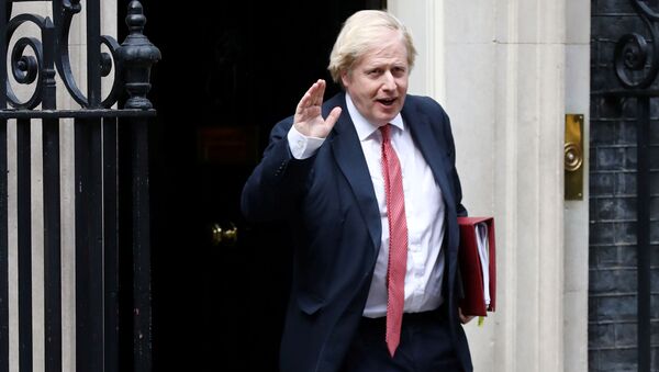 Britain's Prime Minister Boris Johnson leaves 10 Downing Street, following the outbreak of the coronavirus disease (COVID-19), London, Britain, May 11, 2020 - Sputnik International