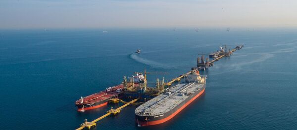 A handout picture provided by Energy giant Saudi Aramco, Saudi Arabia's state-owned oil and gas company, shows its Dhahran oil plants, in eastern Saudi Arabia on November 11, 2018. A handout picture provided by Energy giant Saudi Aramco, Saudi Arabia's state-owned oil and gas company, shows its Dhahran oil plants, in eastern Saudi Arabia on November 11, 2018. - Sputnik International