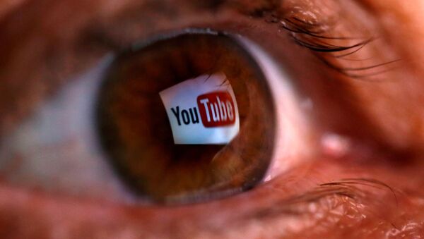 A picture illustration shows a YouTube logo reflected in a person's eye June 18, 2014 - Sputnik International