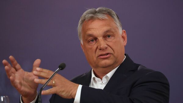 Hungarian Prime Minister Viktor Orban gestures during a news conference with Serbian President Aleksandar Vucic at the presidential building in Belgrade, following the coronavirus disease (COVID-19) outbreak, in Serbia, May 15, 2020 - Sputnik International