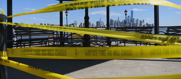 Police tape reading Do Not Cross is wrapped around a gazebo with view of lower Manhattan and One World Trade Center on April 22, 2020 in Hoboken, New Jersey. - The World Health Organization on April 22, warned that the coronavirus crisis would not end any time soon, with many countries only in the early stages of the fight, as the global death toll surpassed 180,000 Police tape reading Do Not Cross is wrapped around a gazebo with view of lower Manhattan and One World Trade Center on April 22, 2020 in Hoboken, New Jersey. - The World Health Organization on April 22, warned that the coronavirus crisis would not end any time soon, with many countries only in the early stages of the fight, as the global death toll surpassed 180,000 - Sputnik International