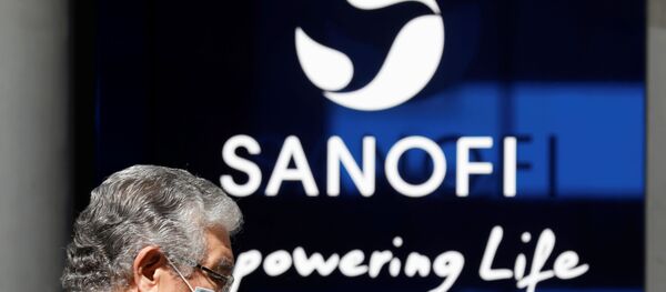 A man wearing a protective face mask walks past the logo of Sanofi at the company's headquarters in Paris, France, April 24, 2020. R A man wearing a protective face mask walks past the logo of Sanofi at the company's headquarters in Paris, France, April 24, 2020. R - Sputnik International