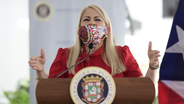 Gov. Wanda Vazquez, wearing a protective face mask, at a press conference in San Juan, Puerto Rico, Thursday, April 16, 2020. - Sputnik International