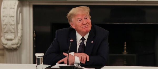 U.S. President Donald Trump speaks with restaurant executives and industry leaders during a coronavirus disease (COVID-19) pandemic meeting in the State Dining Room at the White House in Washington, U.S., May 18, 2020. - Sputnik International