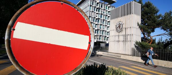 A sign is pictured outside the headquarters of the World Health Organization (WHO) during the World Health Assembly (WHA) following the outbreak of the coronavirus disease (COVID-19) in Geneva, Switzerland, May 18, 2020 - Sputnik International