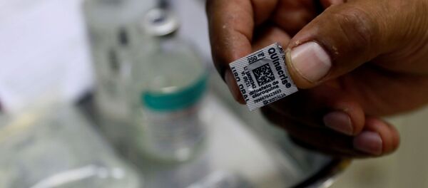 A nurse shows a pill of hydroxychloroquine, amid the coronavirus disease (COVID-19) outbreak, at Nossa Senhora da Conceicao hospital in Porto Alegre, Brazil, April 23, 2020 - Sputnik International