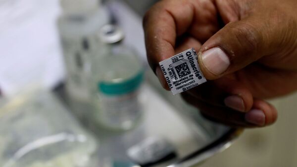 A nurse shows a pill of hydroxychloroquine, amid the coronavirus disease (COVID-19) outbreak, at Nossa Senhora da Conceicao hospital in Porto Alegre, Brazil, April 23, 2020 - Sputnik International