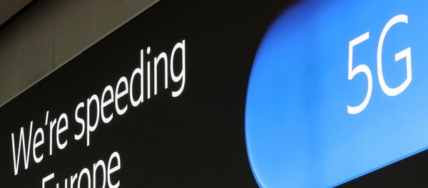 An advertising board shows a 5G logo at the International Airport in Zaventem, Belgium May 4, 2020. - Sputnik International