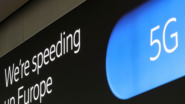 An advertising board shows a 5G logo at the International Airport in Zaventem, Belgium May 4, 2020. - Sputnik International