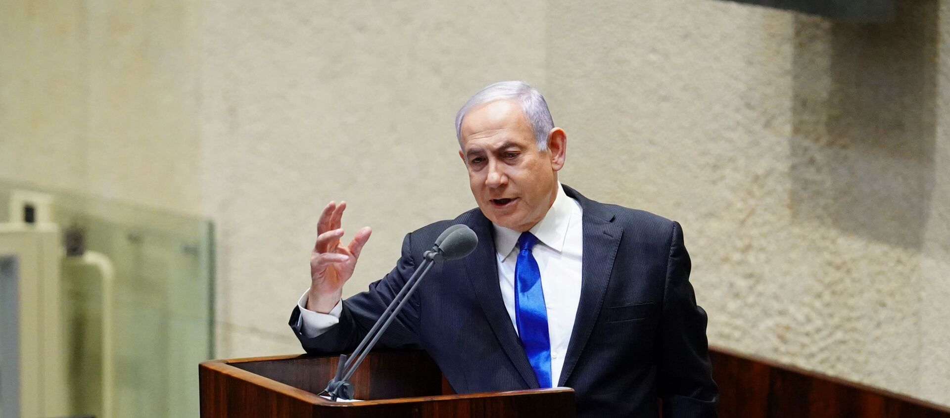 Israeli Prime Minister Benjamin Netanyahu speaks during a swearing in ceremony of his new unity government with election rival Benny Gantz, at the Knesset, Israel's parliament, in Jerusalem May 17, 2020 - Sputnik International, 1920, 24.05.2020