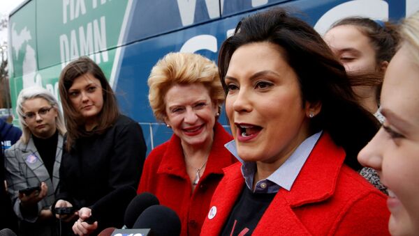 Michigan Democratic gubernatorial candidate Gretchen Whitmer with U.S. Sen. Debbie Stabenow talk to reporters with U.S. arrives to vote in midterm election at her polling station at the St. Paul Lutheran Church in East Lansing, Michigan, U.S. November 6, 2018. - Sputnik International