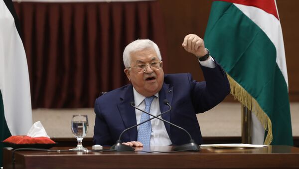 Palestinian President Mahmoud Abbas speaks during a leadership meeting in Ramallah, in the West Bank May 19, 2020 - Sputnik International