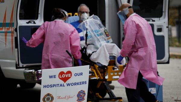 A sign thanking hospital workers is seen outside the ER area at Holy Cross Hospital, amid an outbreak of coronavirus disease (COVID-19), in Fort Lauderdale, Florida, U.S., April 20, 2020. - Sputnik International