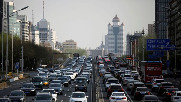 Cars are seen in a traffic jam during evening rush hour in Beijing, as the country is hit by an outbreak of the novel coronavirus (COVID-19), China April 8, 2020. - Sputnik International