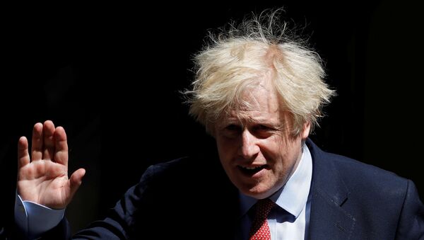 Britain's Prime Minister Boris Johnson in Downing Street following the outbreak of the coronavirus disease (COVID-19), London, Britain, May 20, 2020. - Sputnik International